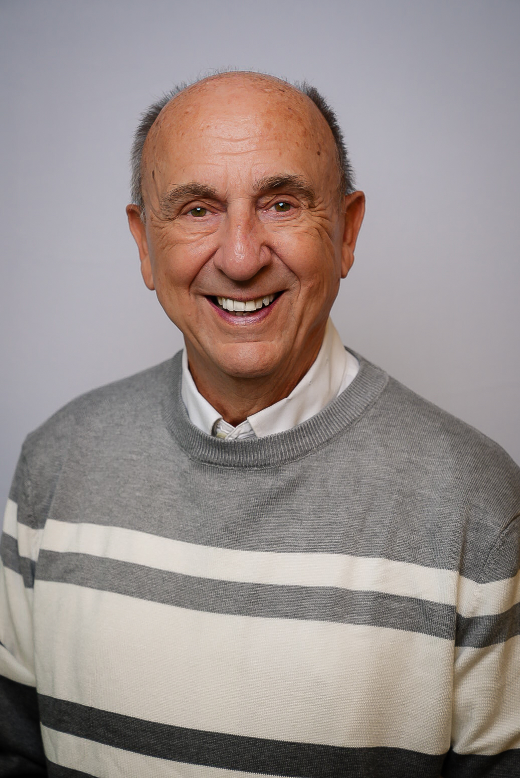 Head Shot Sept 2025 grey sweater